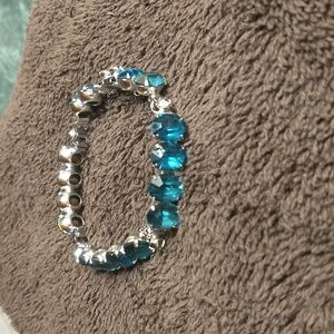 Blue Sapphire colored rhinestone and silver tone bracelet.